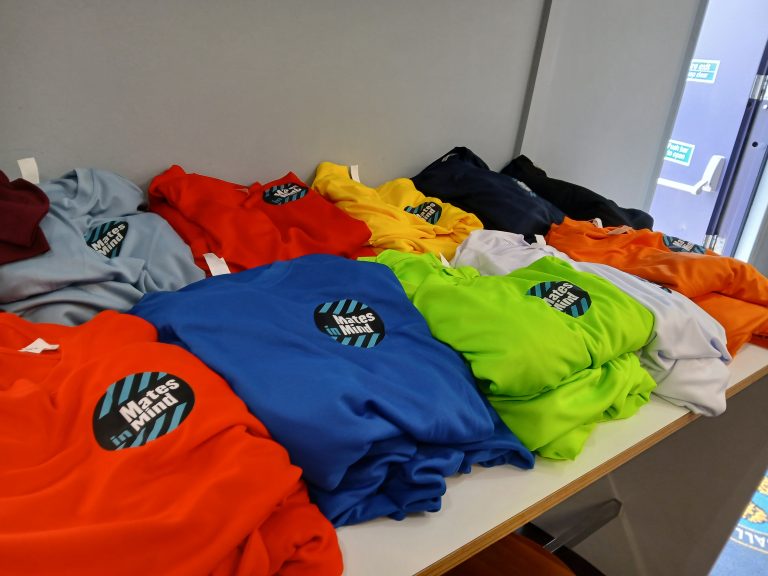 Branded football kits for a charity game.