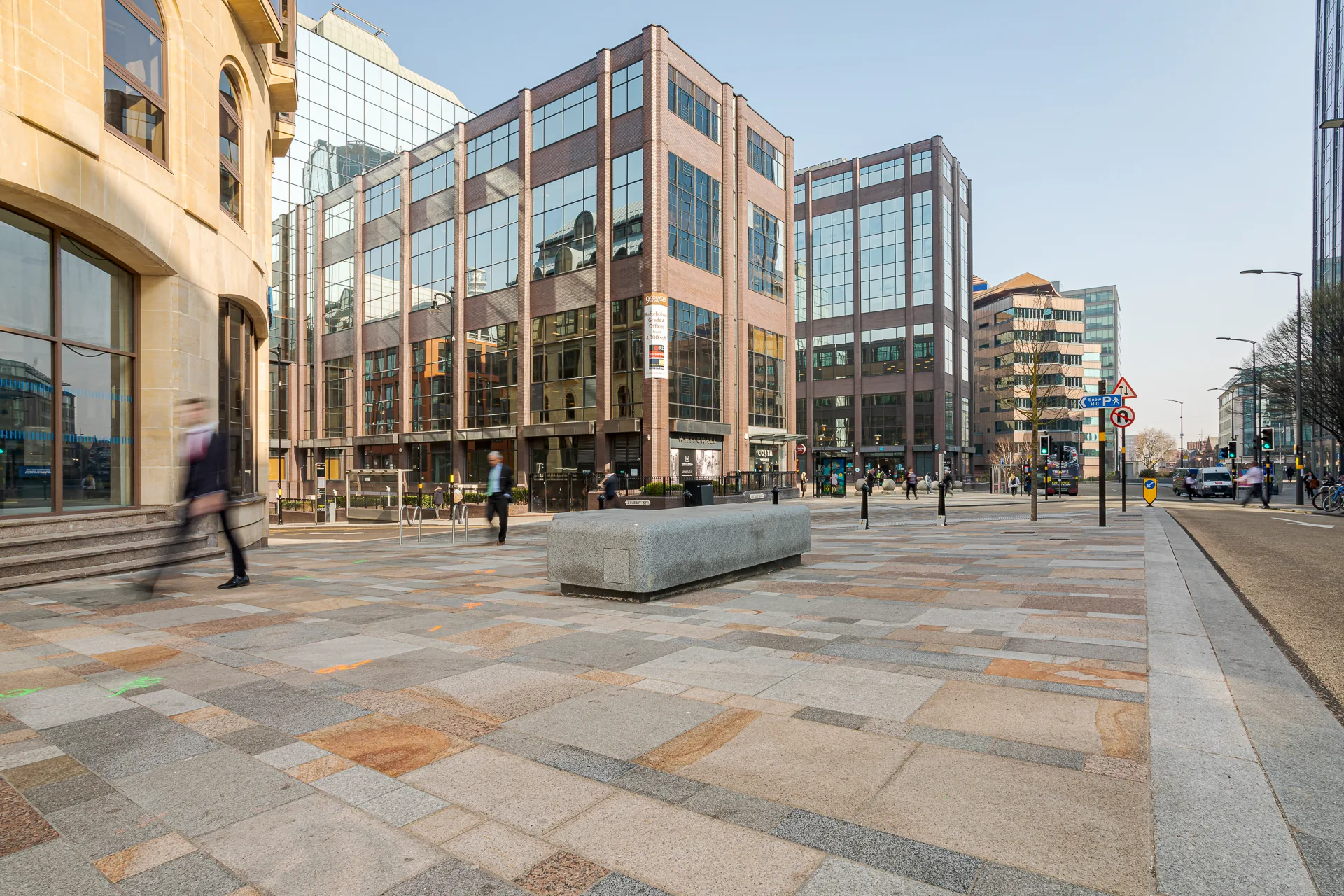 The finished Snow Hill public realm in Birmingham, new paving between the office buildings